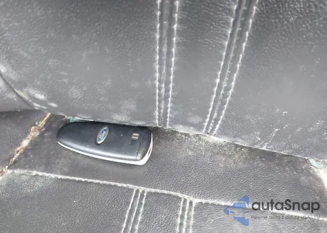 2014 Ford Focus Titanium z USA, uszkodzony, nr VIN 1FADP3J20EL132573